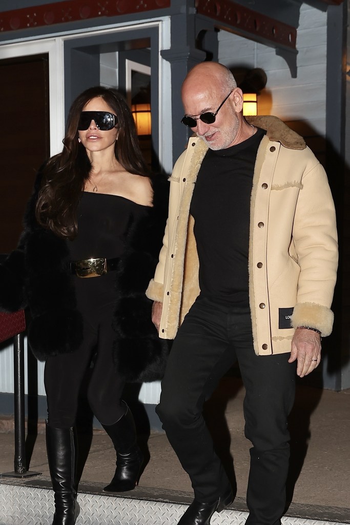 Bezos and Sanchez wear dark sunglasses during a nighttime Aspen date.