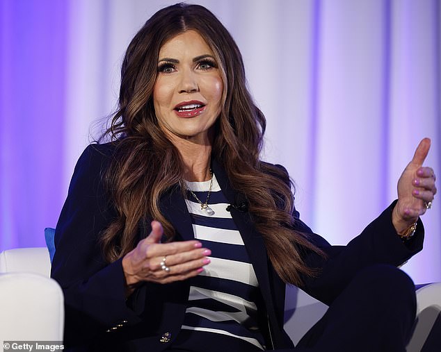 South Dakota Gov. Kristi Noem wearing the long, glossy 'MAGA hair' style