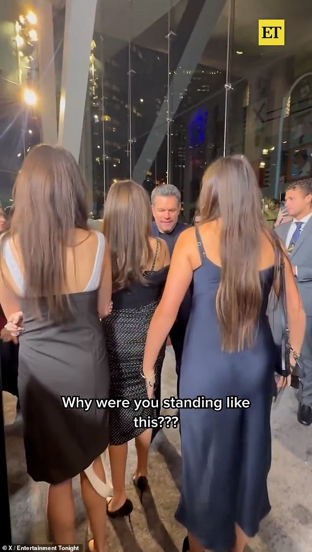 Gia Damon playfully mimics Matt Damon's posture on The Rip red carpet