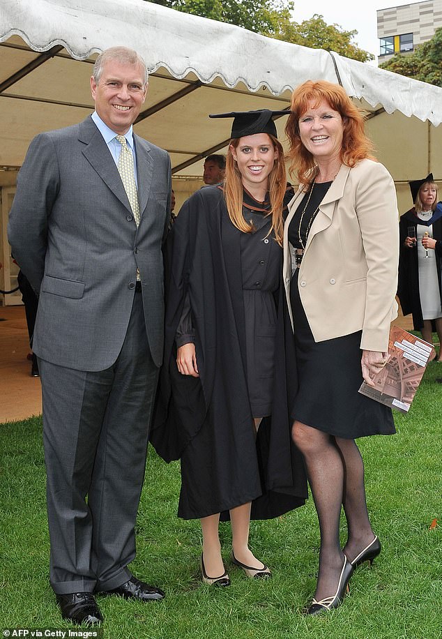 Princess Beatrice with Andrew and Sarah Ferguson after her graduation at Goldsmiths College in London on September 9, 2011