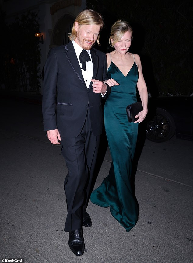 Jesse Plemons and Kirsten Dunst looked dapper as they walked arm in arm
