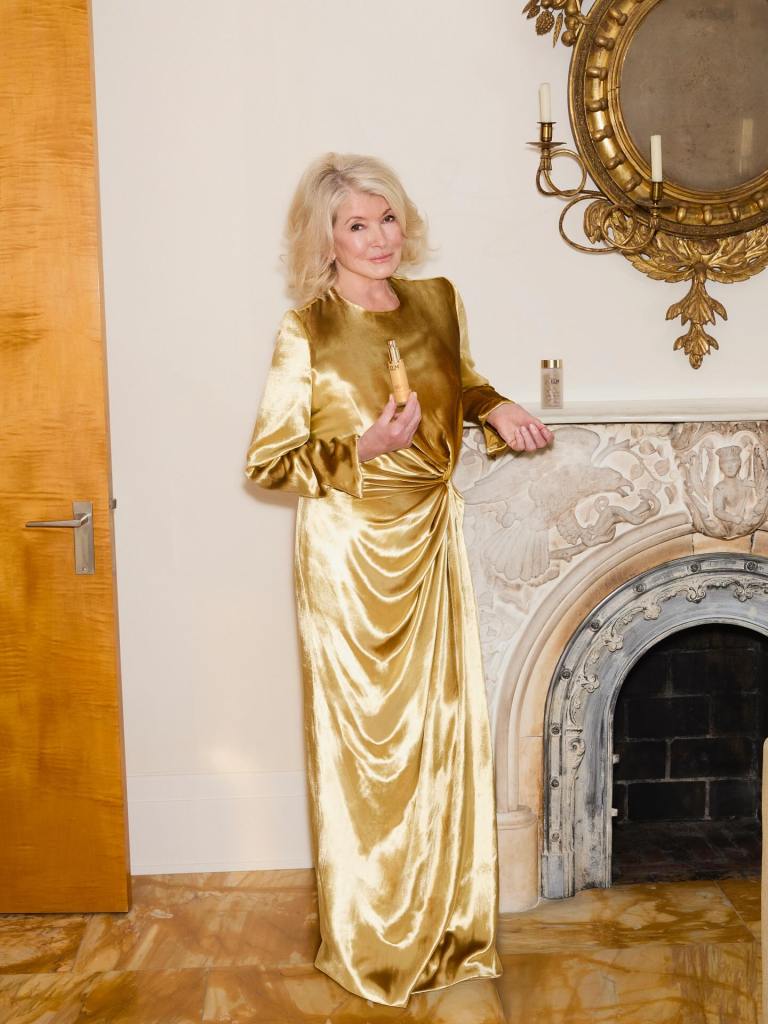 Martha Stewart in a gold dress, nodding to her sultry Instagram persona.