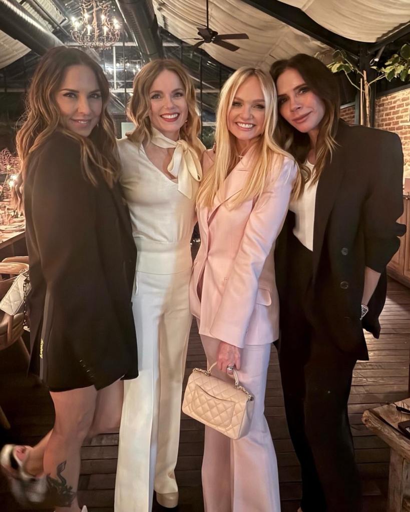Melanie C, Geri Halliwell, Emma Bunton, and Victoria Beckham pose together.