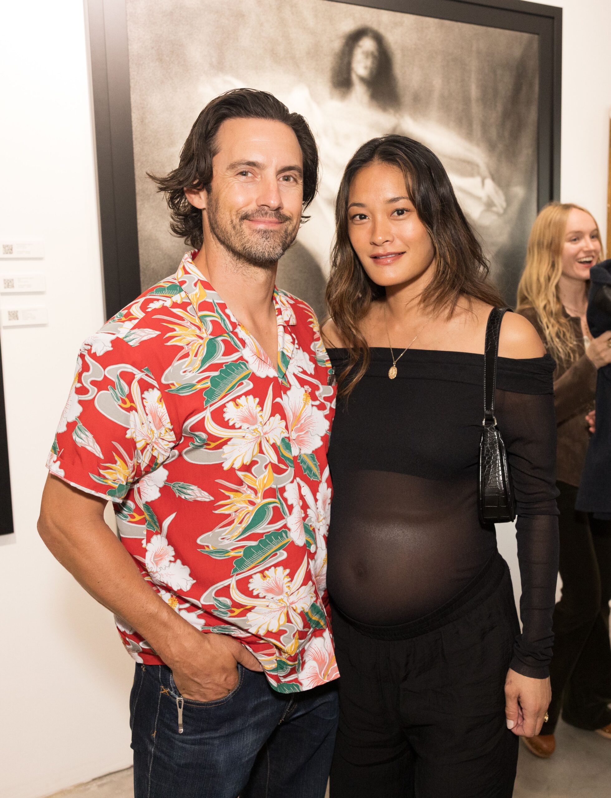 Milo Ventimiglia and Jarah Mariano at the JOYRIDE exhibition.