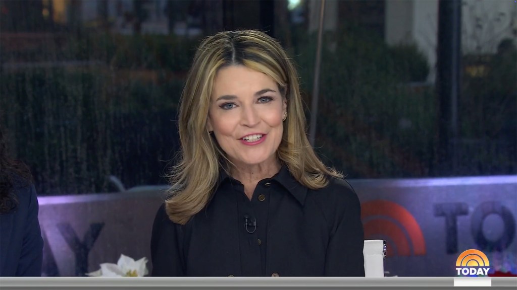 Savannah Guthrie smiling; she later married Michael Feldman and has two children.