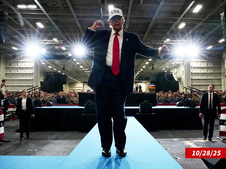 Trump shifts from a mock lift into a jerky dance during the Kennedy Center appearance.