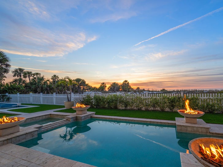 Heated pool and spa at sunset overlooking the Gulf at Hulk Hogan's Clearwater Beach estate
