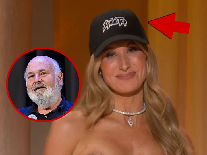 Nikki Glaser onstage at the Golden Globes wearing a black-and-white 'Spinal Tap' hat