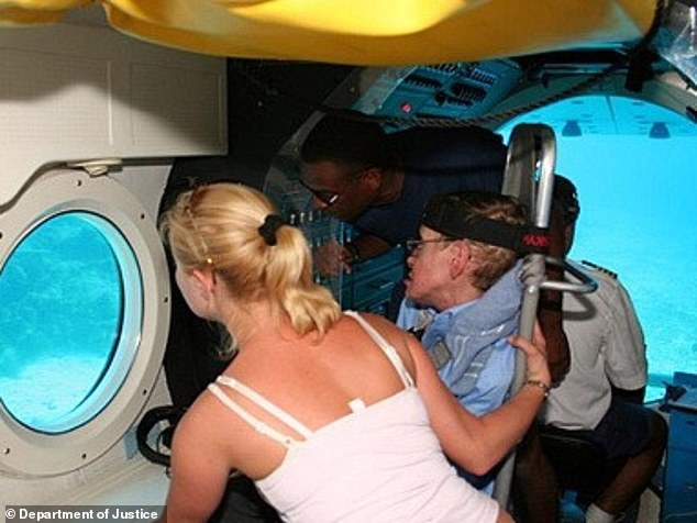 Stephen Hawking during a 2006 submarine tour around Little Saint James, in a vessel modified to accommodate him