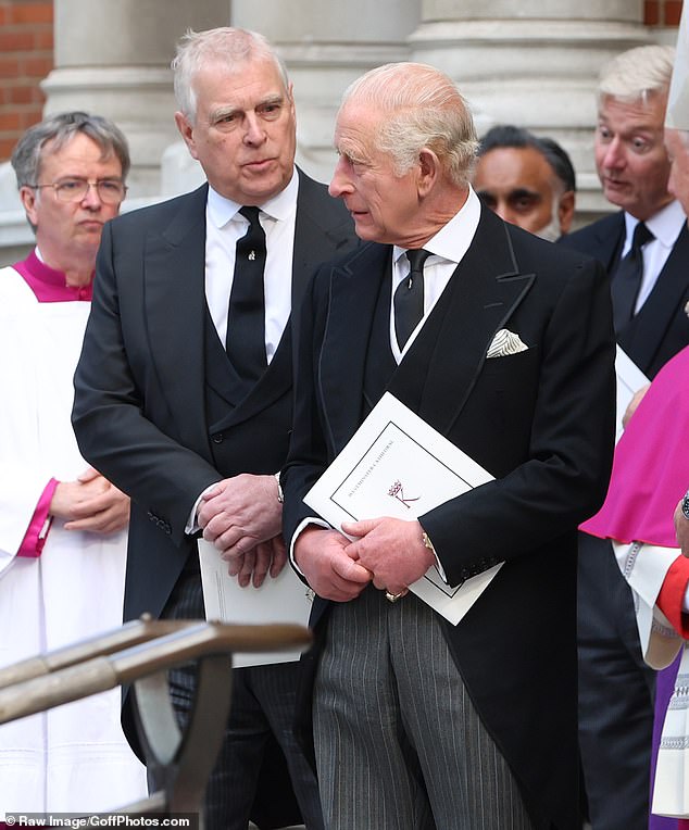 King Charles III speaking with Prince Andrew during a public appearance