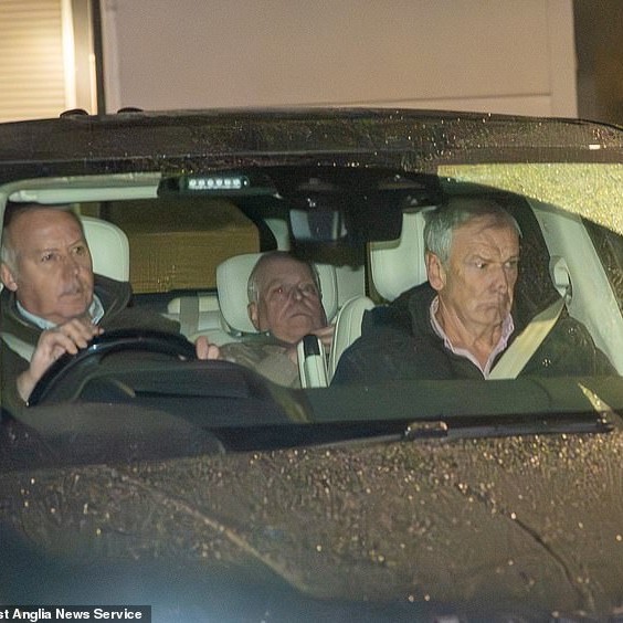 Andrew Mountbatten-Windsor as he left Aylsham police station could be seen slouching in the back of his vehicle - Daily Mail US