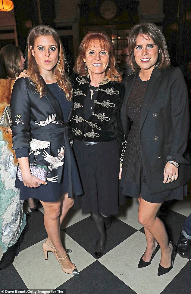 Sarah Ferguson with Princess Beatrice and Princess Eugenie at a public event
