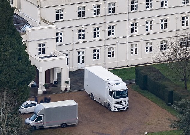 Removal vans parked outside Royal Lodge as Prince Andrew moves out