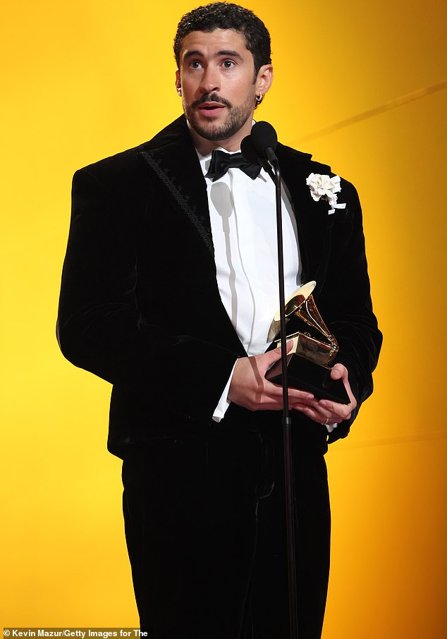 Bad Bunny holds his Grammy after winning Album of the Year for "Debi Tirar Mas Fotos"