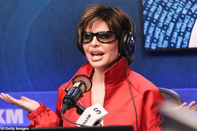 Lisa Rinna speaks into a microphone during a SiriusXM radio appearance