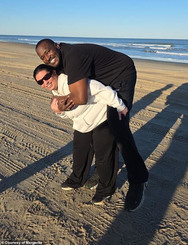 Quinton Aaron and Margarita together on a beach