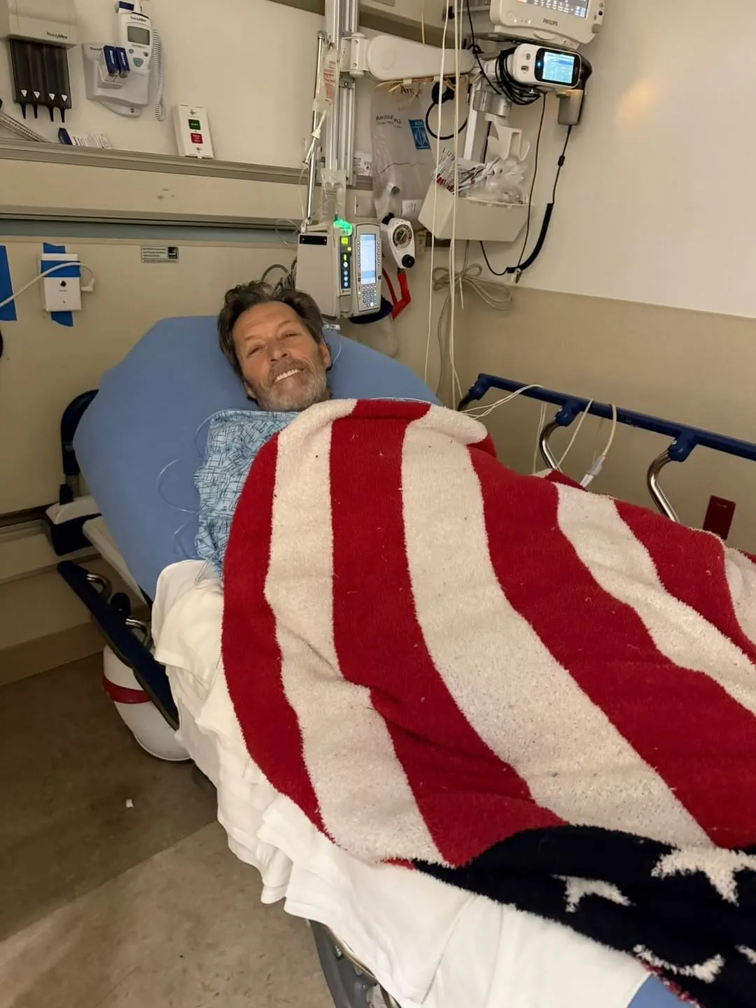Ron Duguay in a hospital bed amid cancer treatment
