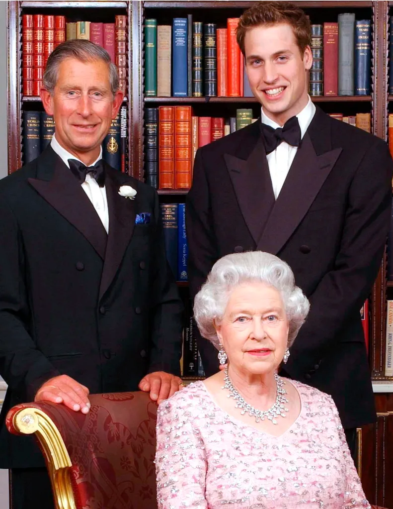 Queen Elizabeth II seated with her son, Prince Charles, and grandson, Prince William, standing behind her.