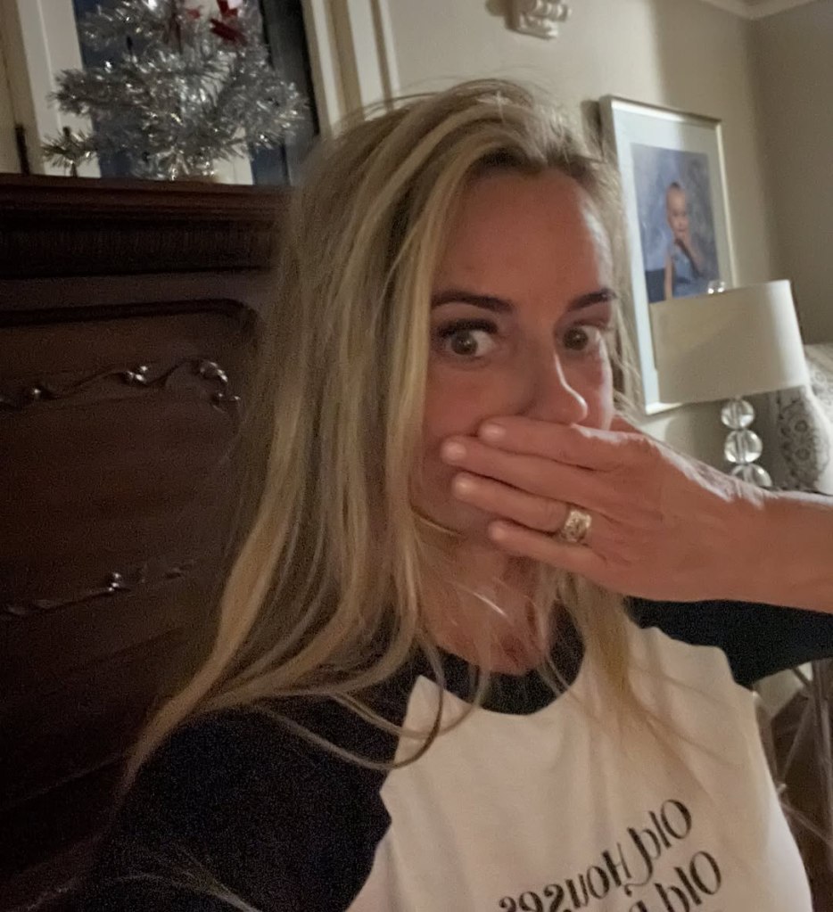 Nicole Curtis with her hand over her mouth.