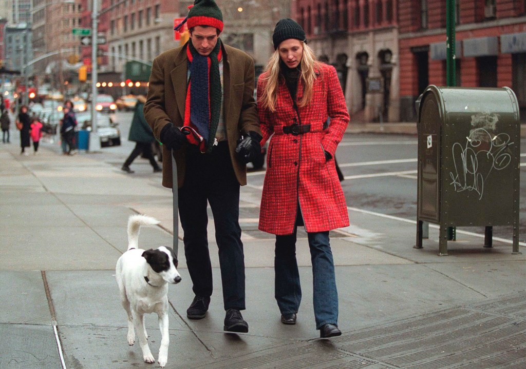 John F. Kennedy Jr. and Carolyn Bessette-Kennedy walking their dog Friday near their Tribeca home.