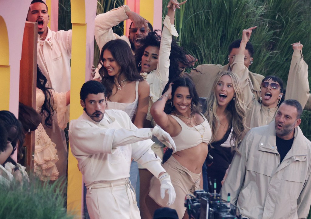 Bad Bunny performs with Jessica Alba, Alix Earle, and David Grutman at the Super Bowl LX Halftime Show.