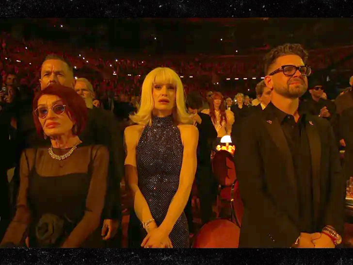 Sharon, Kelly and Jack Osbourne react in the audience during the Ozzy tribute at the 2026 Grammys
