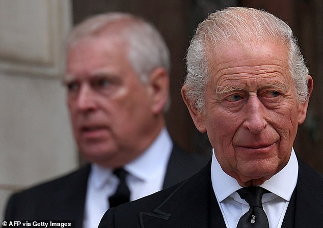 King Charles III with his brother Prince Andrew at a public event