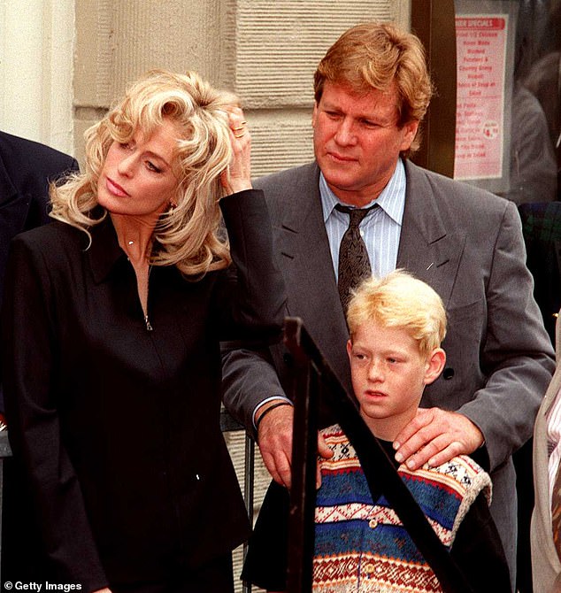 Farrah Fawcett and Ryan O'Neal with their son Redmond in 1995.