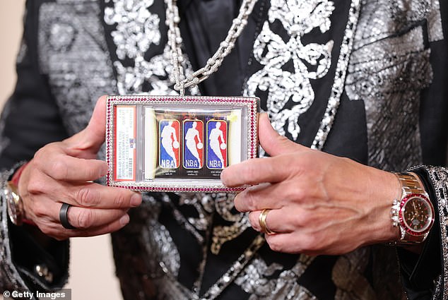 Close-up of the bespoke Tiffany & Co. jeweled case with the one-of-one Triple Logoman NBA card featuring patches from Michael Jordan, Kobe Bryant, and LeBron James.