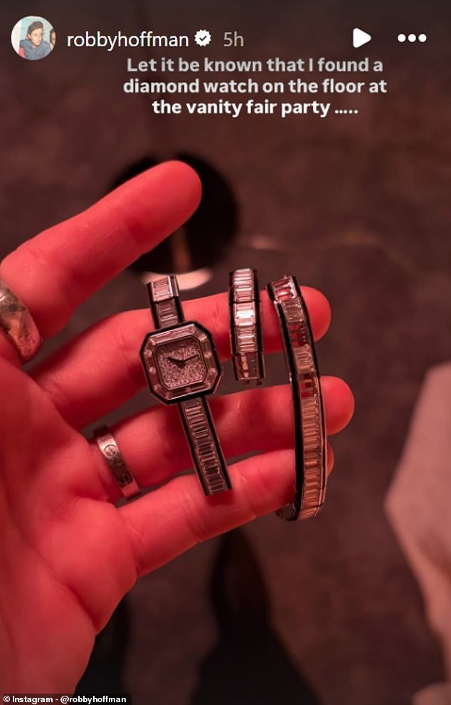 Robby Hoffman holds a diamond Boucheron watch she found at the Vanity Fair Oscars party