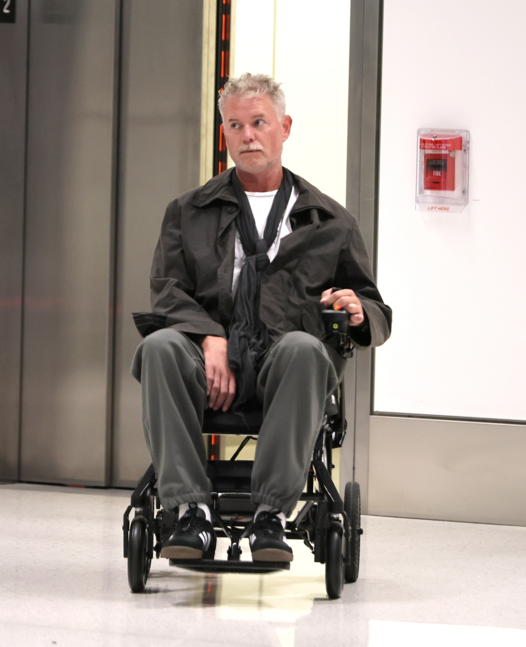 Eric Dane in a wheelchair at LAX after announcing his ALS diagnosis