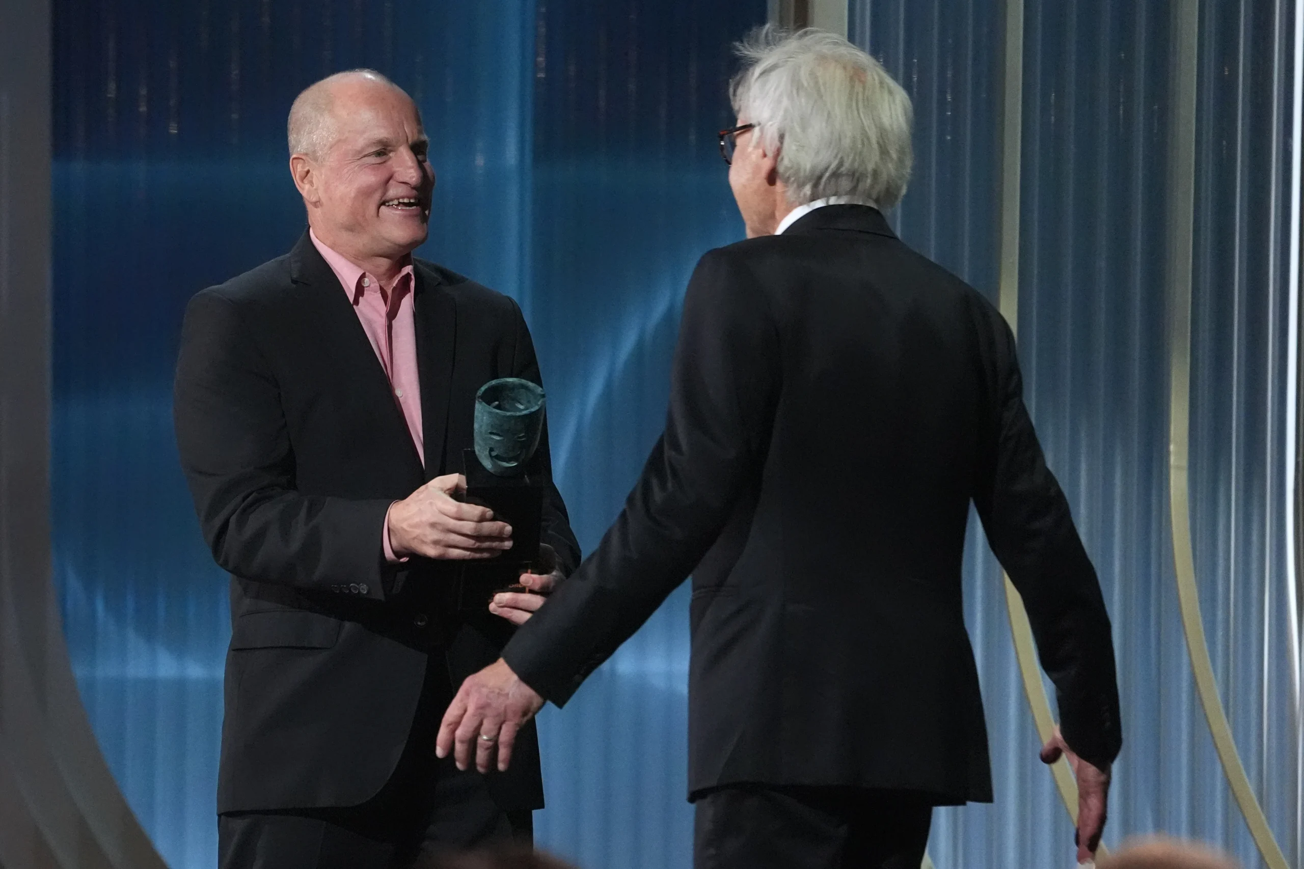 Woody Harrelson presents the SAG Life Achievement Award to Harrison Ford.