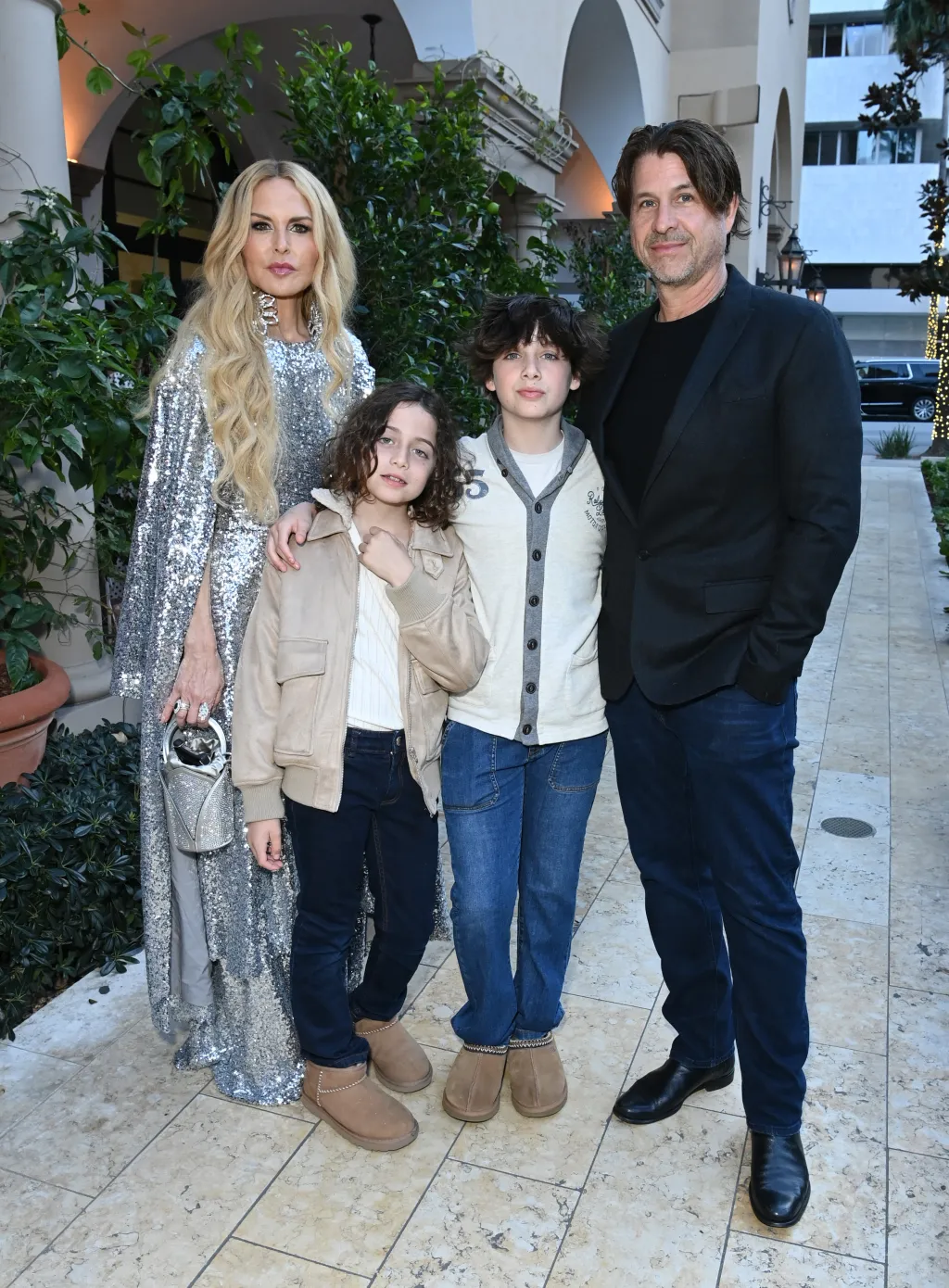 Rachel Zoe and Rodger Berman posing with their two sons at an event in 2024.