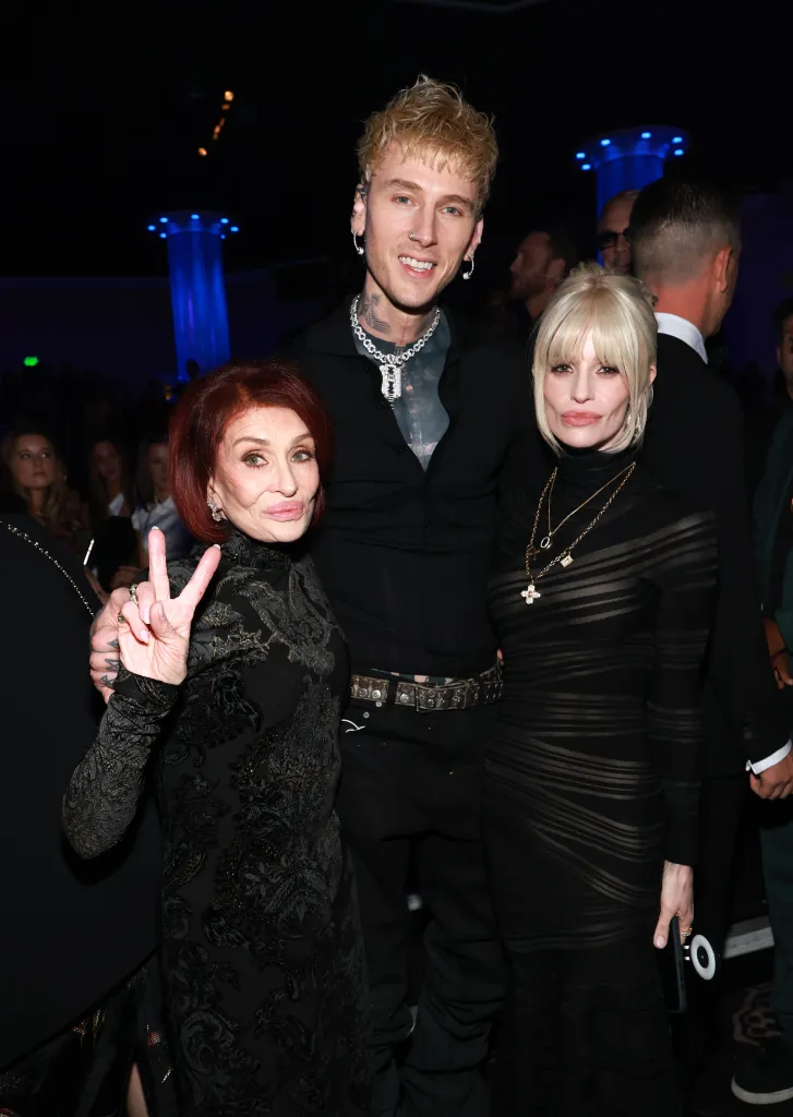 Sharon and Kelly posed with Machine Gun Kelly at a pre-Grammys party on Jan. 31.