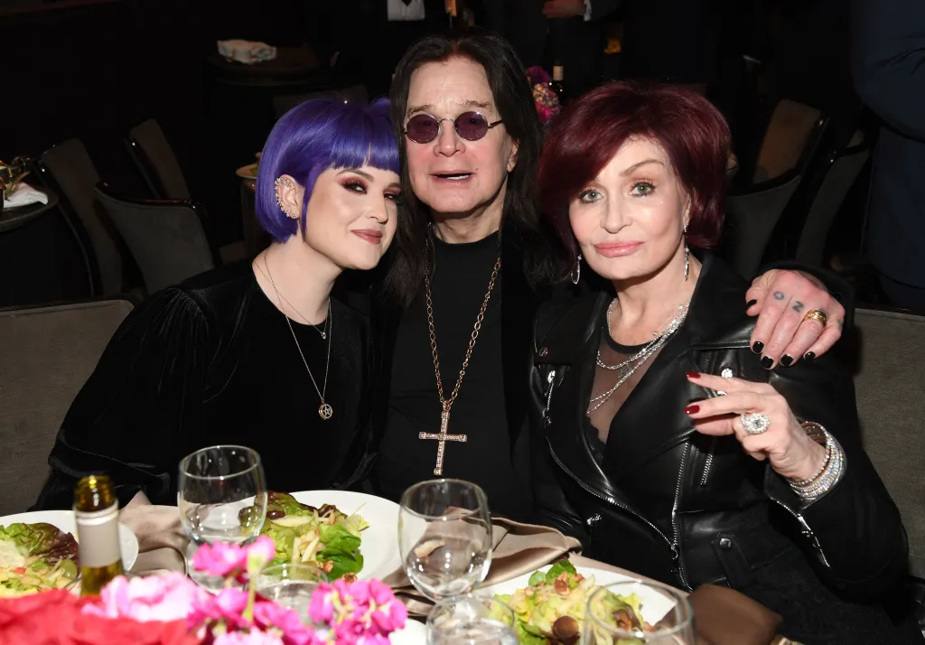 Kelly Osbourne, Ozzy Osbourne, and Sharon Osbourne at a gala.