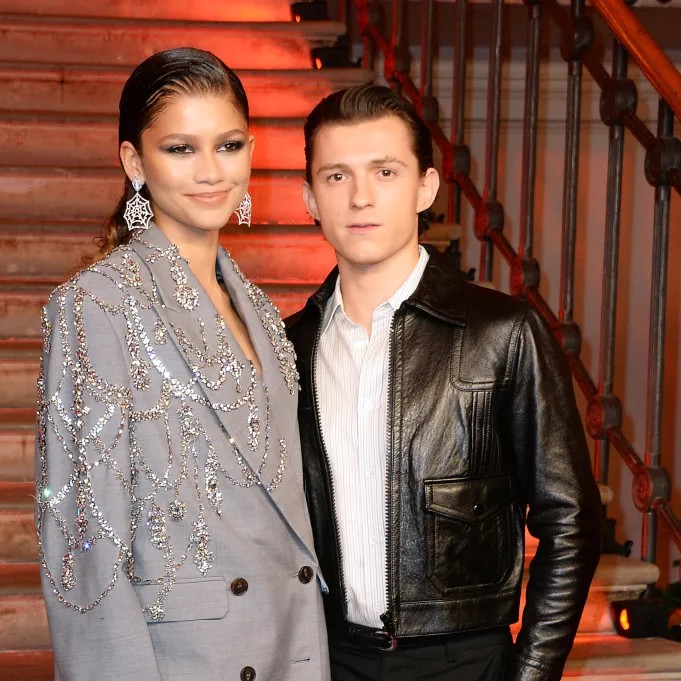 Zendaya wore what appeared to be a gold wedding band in a new photo shoot for "The Drama," starring her and Robert Pattinson, further speculating she and Tom Holland are already married. The couple is pictured here in London in December 2021. - Dave Benett/WireImage