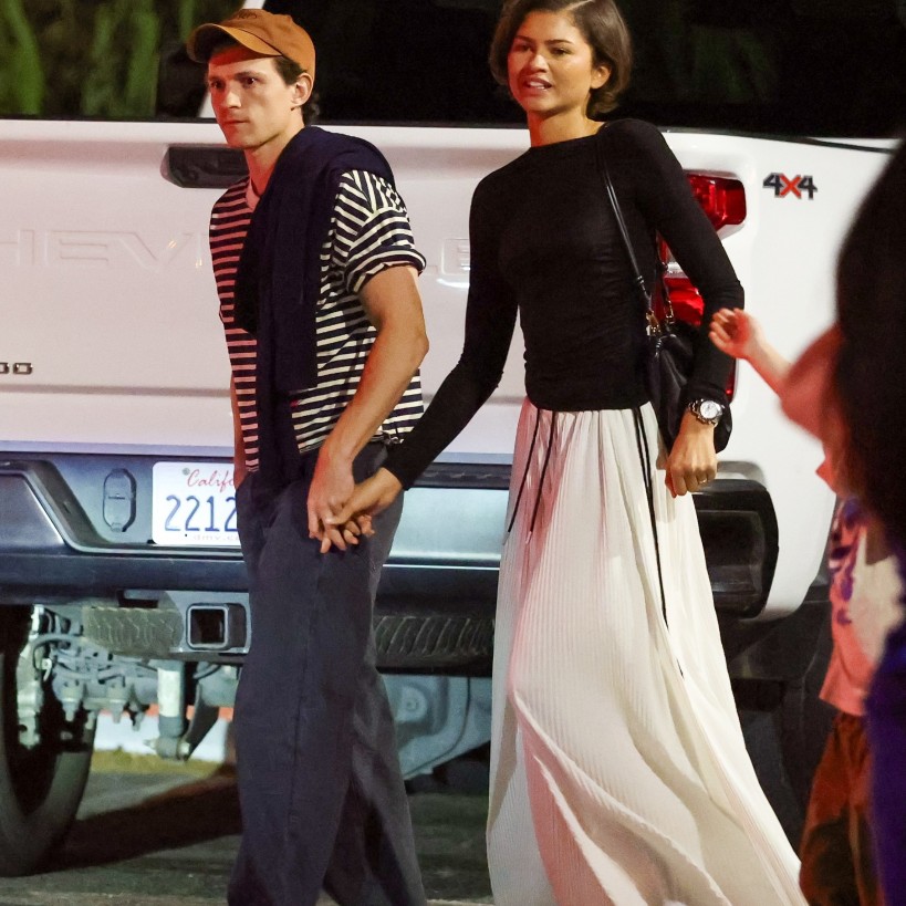 Zendaya showed off her gold band while out to dinner with Tom Holland and friends on Friday night. - The Daily Stardust / BACKGRID