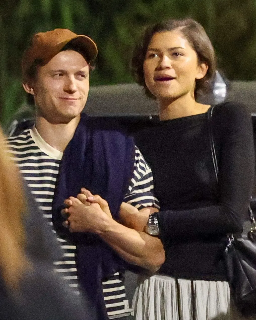 Zendaya and Tom Holland hold hands during a casual night out in Los Angeles.