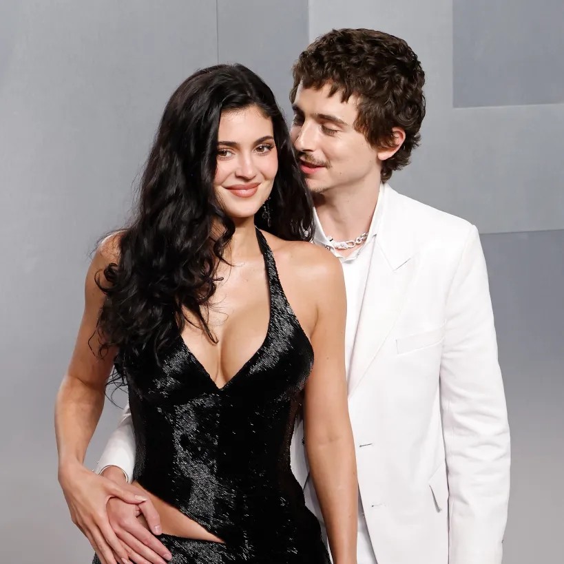 Jenner rocked a plunging black halter top and matching skirt. - Getty Images for Vanity Fair