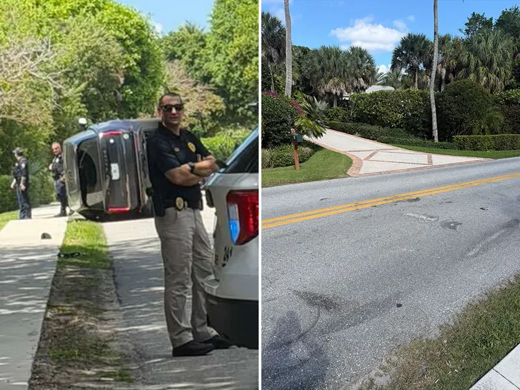 Overturned SUV and officers at the scene of Tiger Woods' reported crash in Jupiter, Florida (Backgrid)