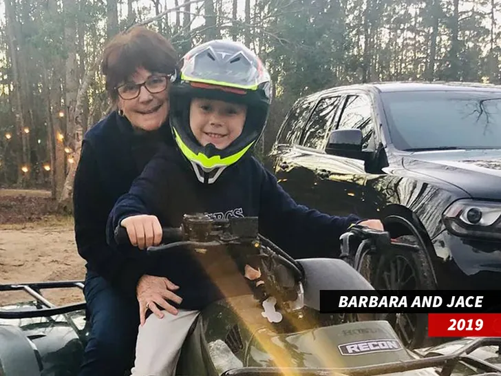 Barbara Evans riding an ATV with grandson Jace in an older photo