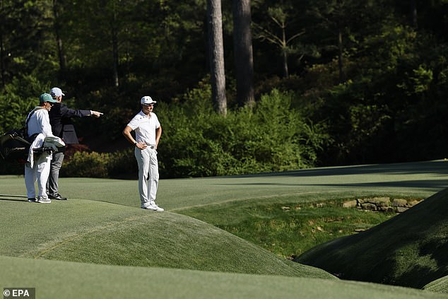 Li found treacherous Rae's Creek winding in front of the raised 13th green on Saturday