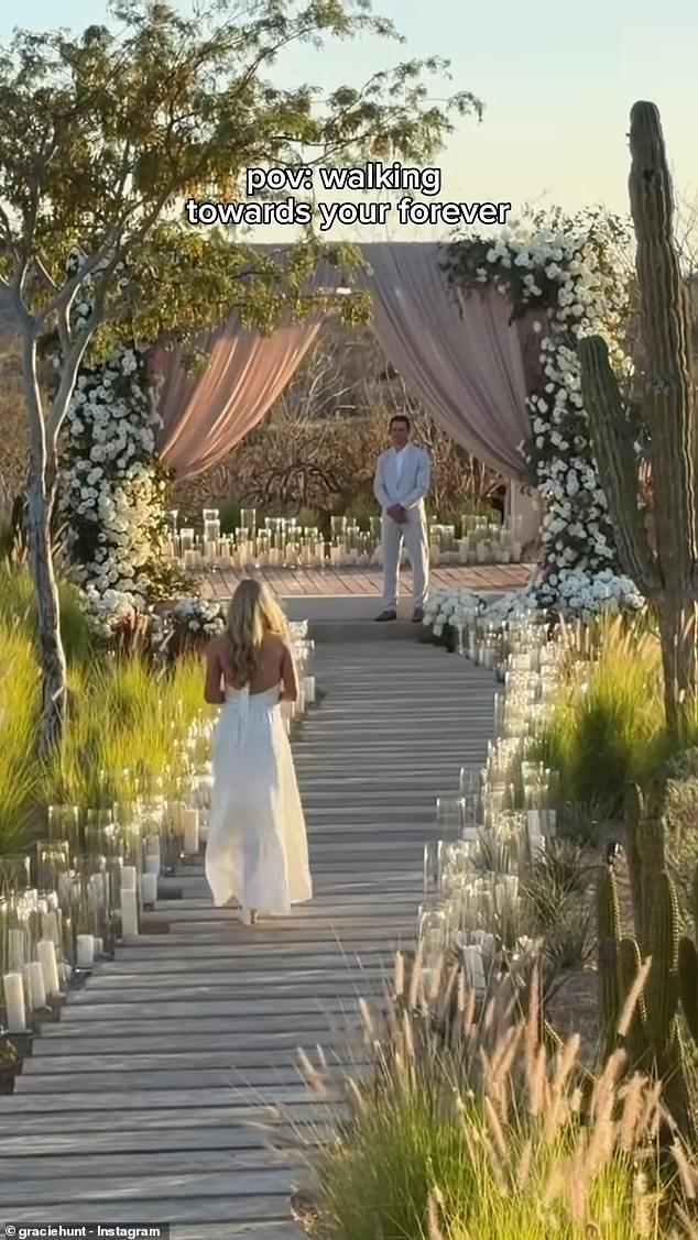 Hunt walks down a candlelit desert aisle toward Derek Green