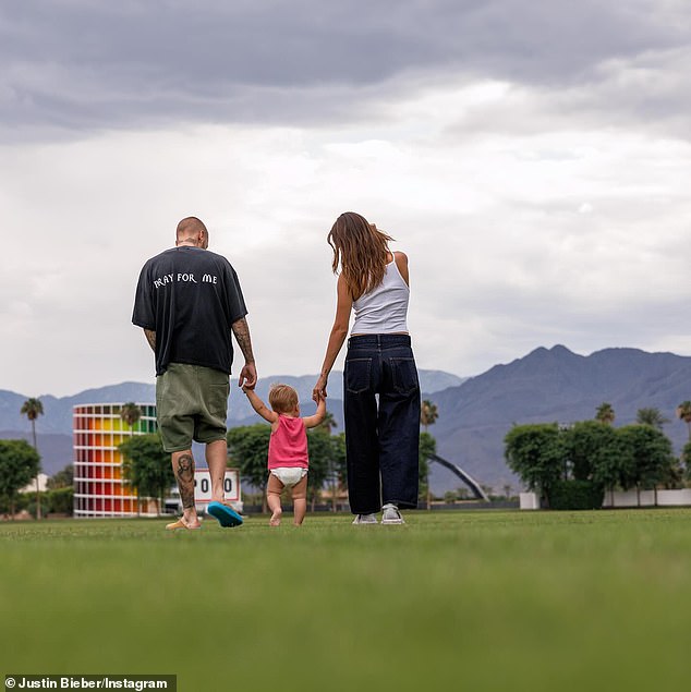 Justin, Hailey, and their son Jack walking the festival grounds at Coachella.