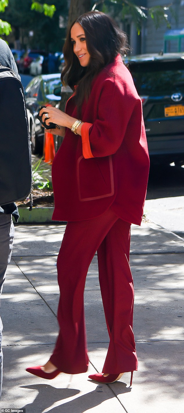 Meghan Markle in Loro Piana cashmere during a 2021 visit to a Harlem public school