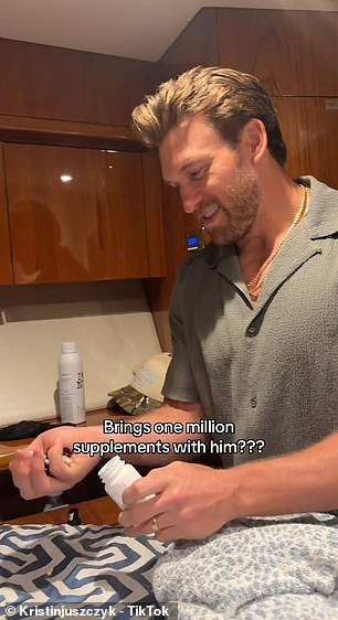 Kyle Juszczyk lining up an array of supplements during vacation