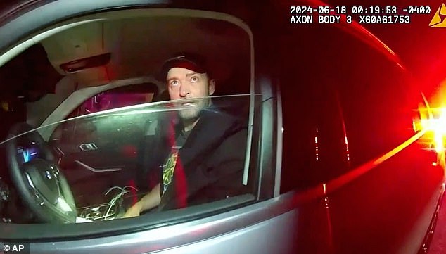 Body camera still showing Justin Timberlake seated in his car before his DWI arrest