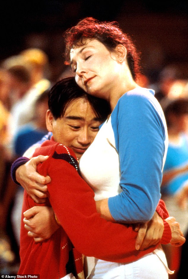 Gedde Watanabe with Deborah Pollack in Sixteen Candles (1984)