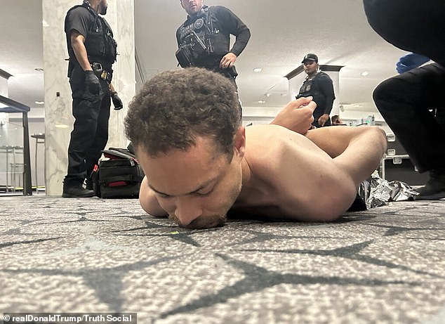 Suspect Cole Allen in police custody after being subdued near the ballroom doors
