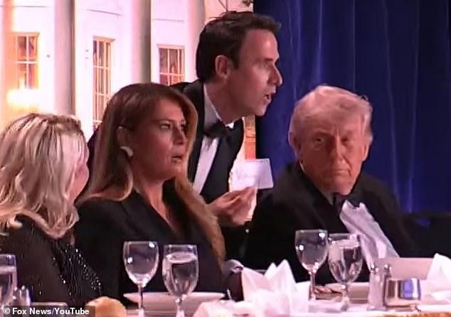 First Lady Melania Trump moments before the panic, looking stunned at the head table